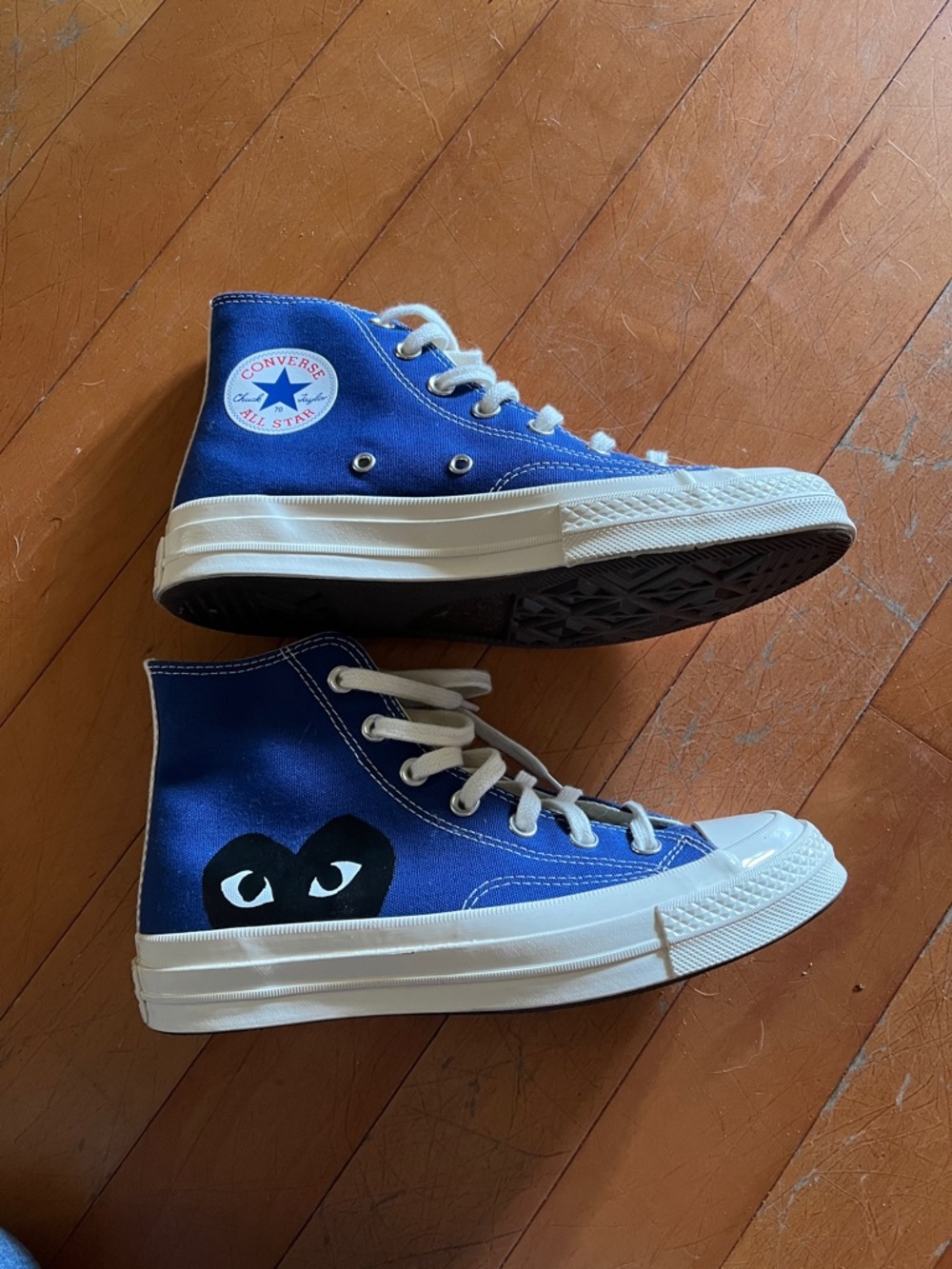 Comme des Gascons Play and converse Navy Blue High-Top Sneakers .